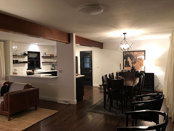 View from front door - looking into living, dining and kitchen