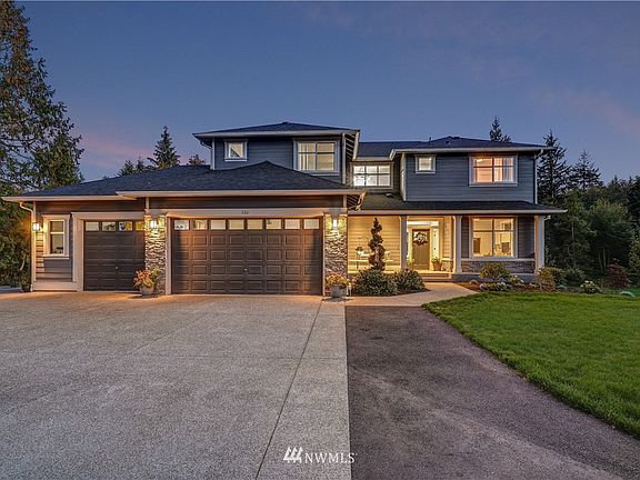 Stunning curb appeal with large driveway and 3 car garage