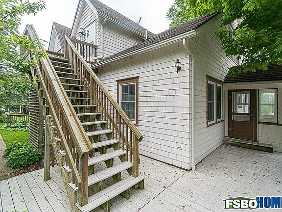Private stairway entrance and small balcony from shared outdoor living area