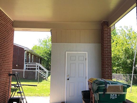 Built in shed under carport