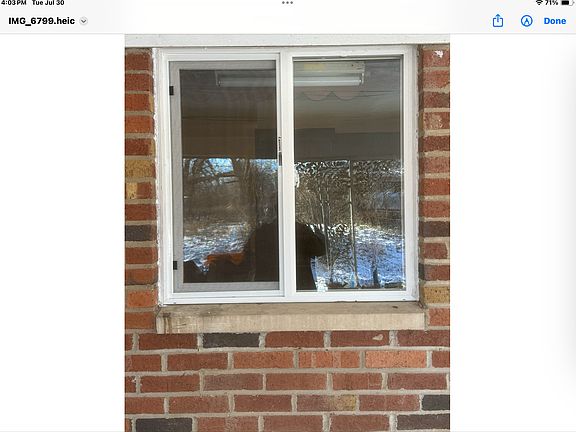 Kitchen window from carport