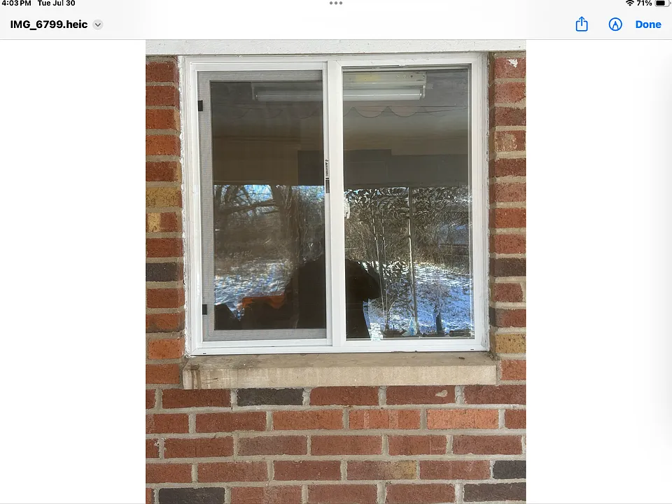 Kitchen window from carport