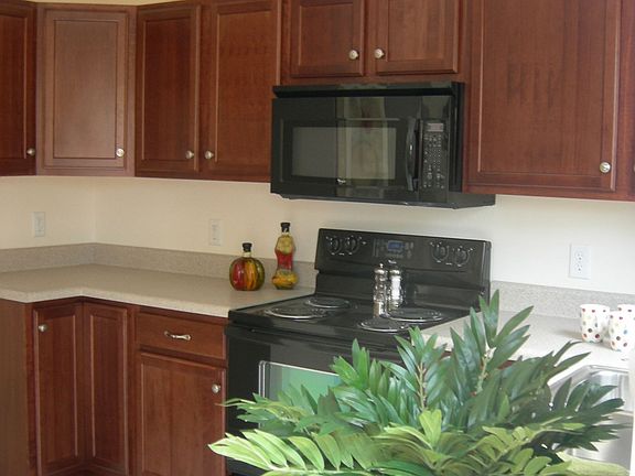 Spacious kithchen w/maple or oak cabinets standard.