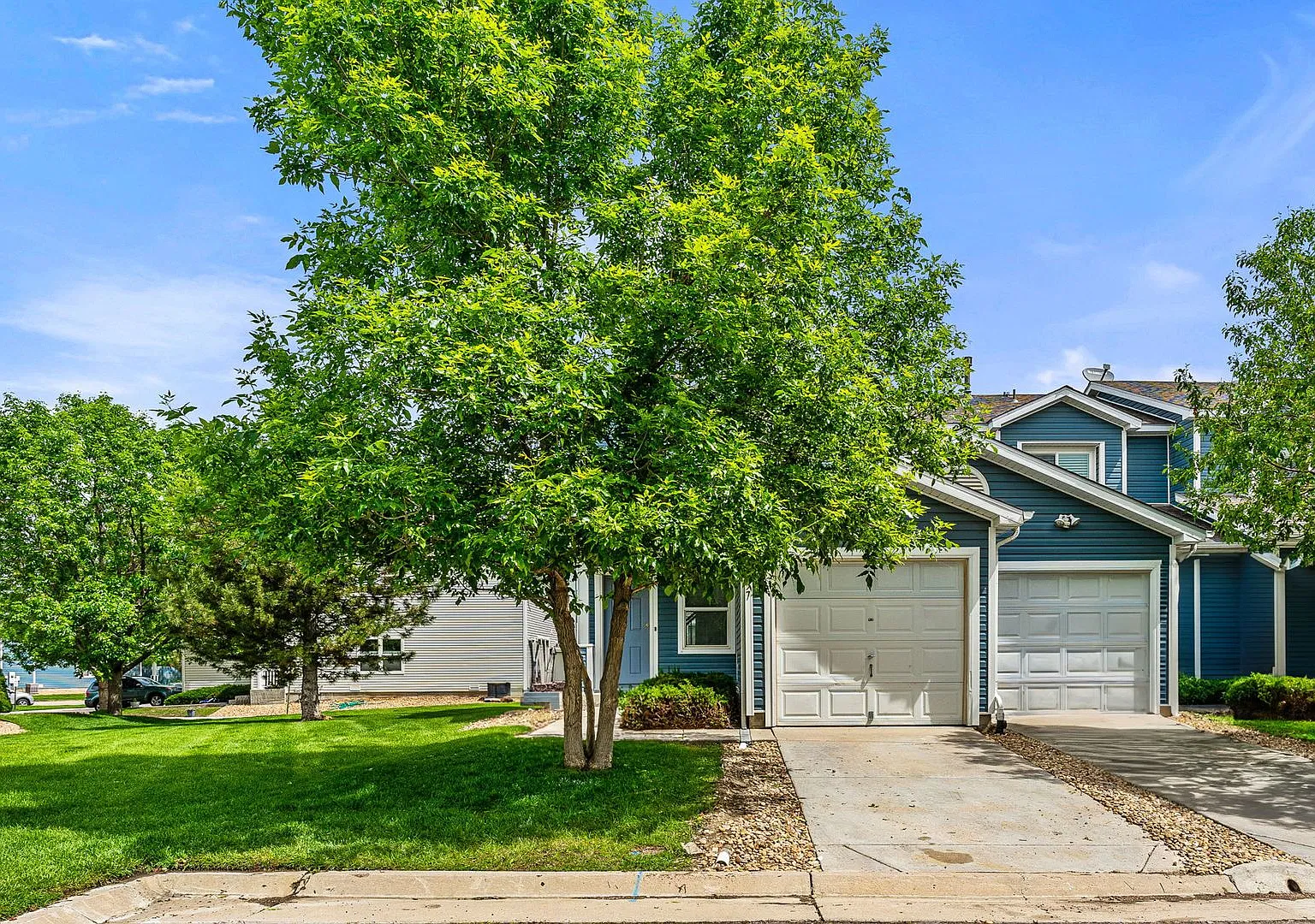 End-unit townhome in Cherry Creek School District with private yard — Photo 1