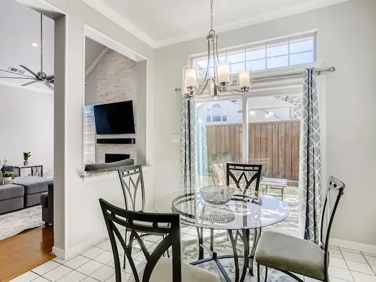 Kitchen dining table w/ access to the patio to get some fresh air