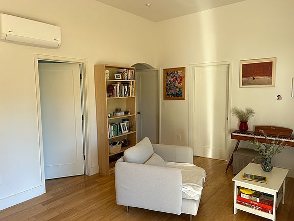 Primary bedroom on left, other 2 bedrooms on right