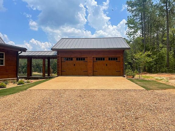 Detached garage & covered walk to lodge