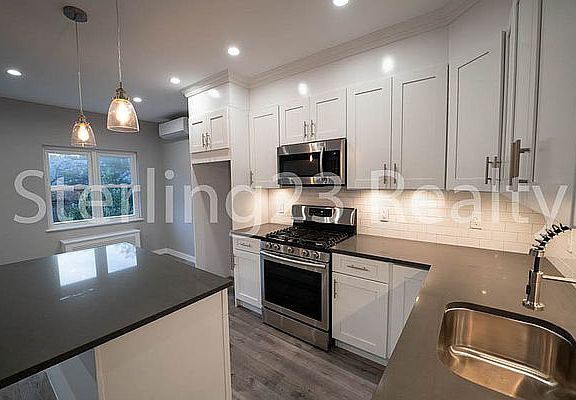 2nd image of 19-61 80th St #2