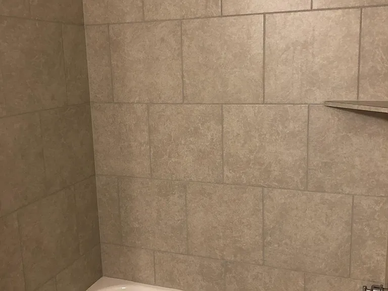 2nd bath combo tub/shower with neutral tile work