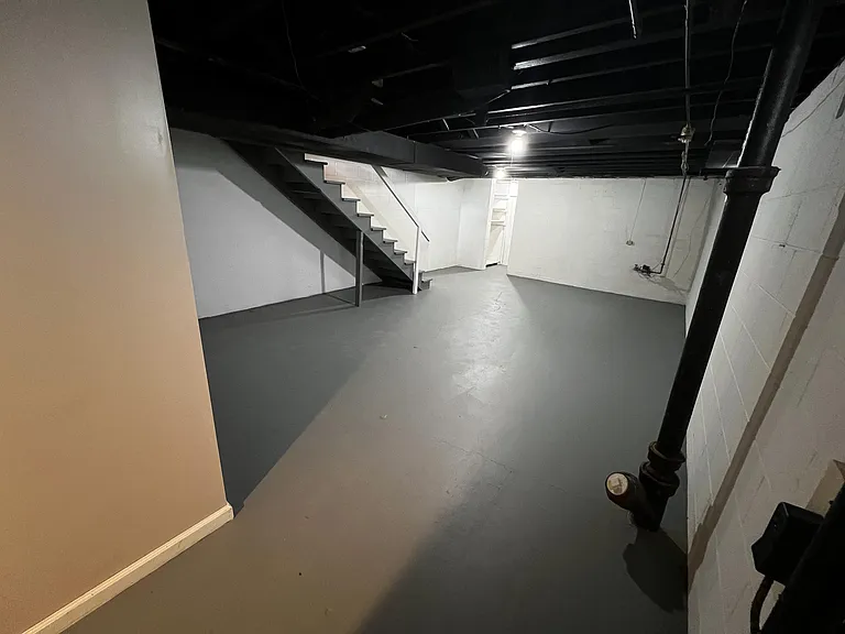Spacious finished basement with built-in storage