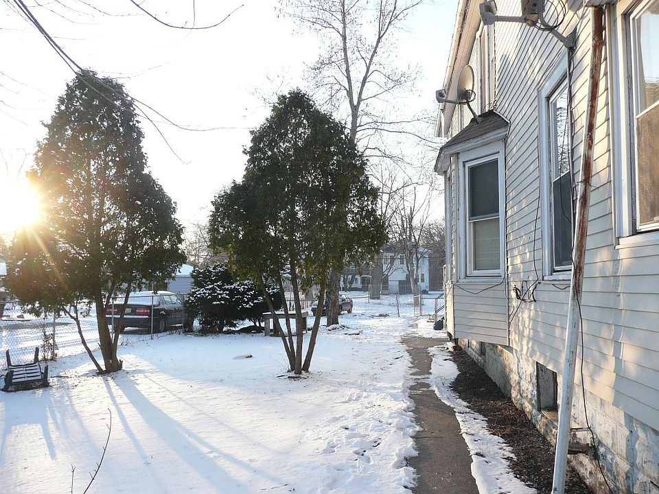 Fenced yard includes vacant lot