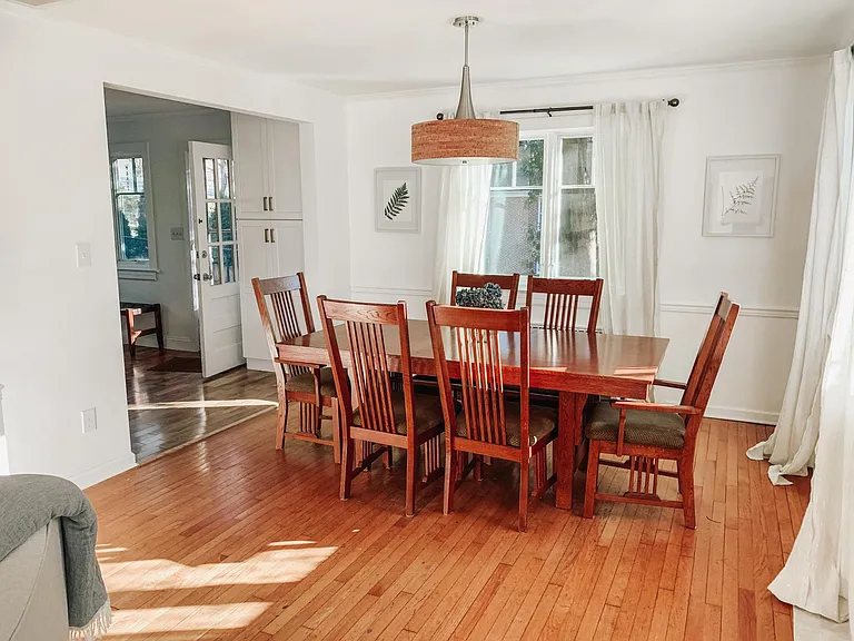 Dining Room Open to Living Room and Leads into Kitchen