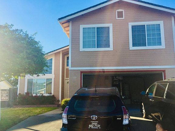 Two car garage.
Quiet street with view of hilltop