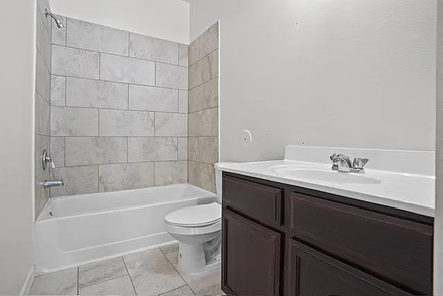 Guest bathroom with tile backsplash and bathtub and stand up shower