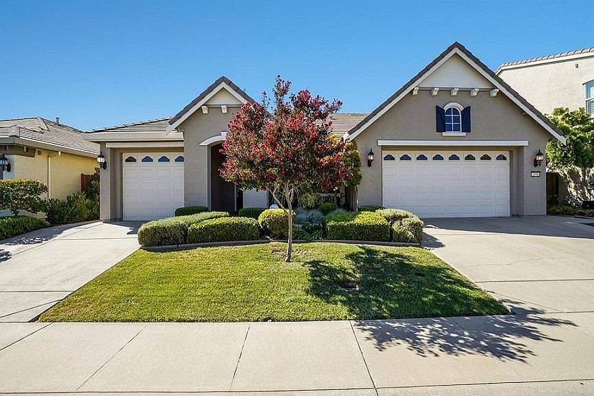 Front with 3 car garage