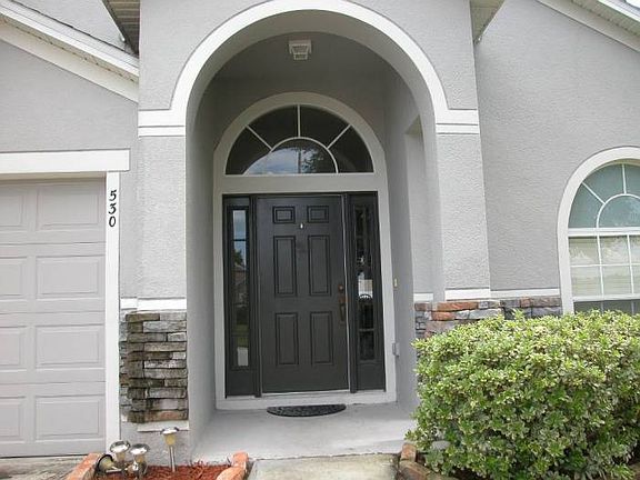 Front door & stone accent