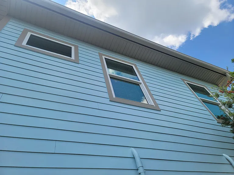 East side windows. One in rest room and two in bedroom. These are 2 of the 3 bedroom windows.