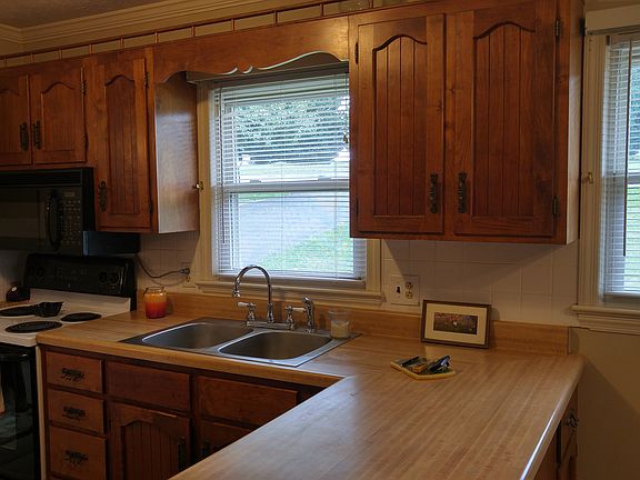 Charming kitchen with a wind