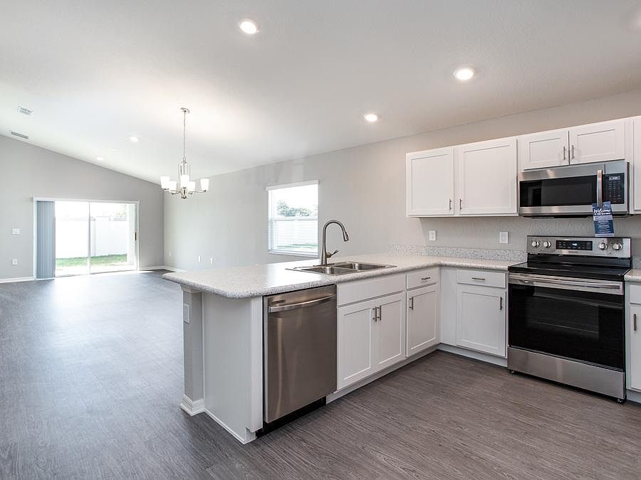 Brand-new, open layout, 3-bedroom home for sale in Davenport, FL - Photo showcases the home layout -