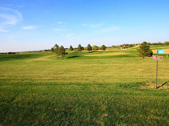 Lot with 14th green in back.