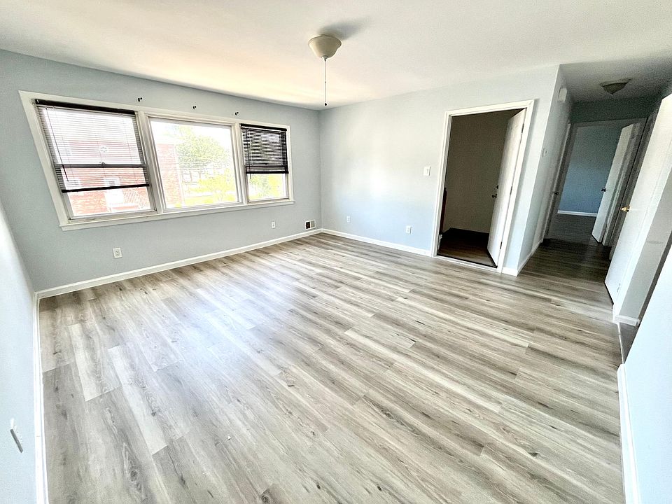 Spacious living room with plenty of light from the south-facing picture windows