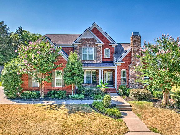 This 4,729sqft home is on a No Thru Traffic circle! (Photo taken in the summer)