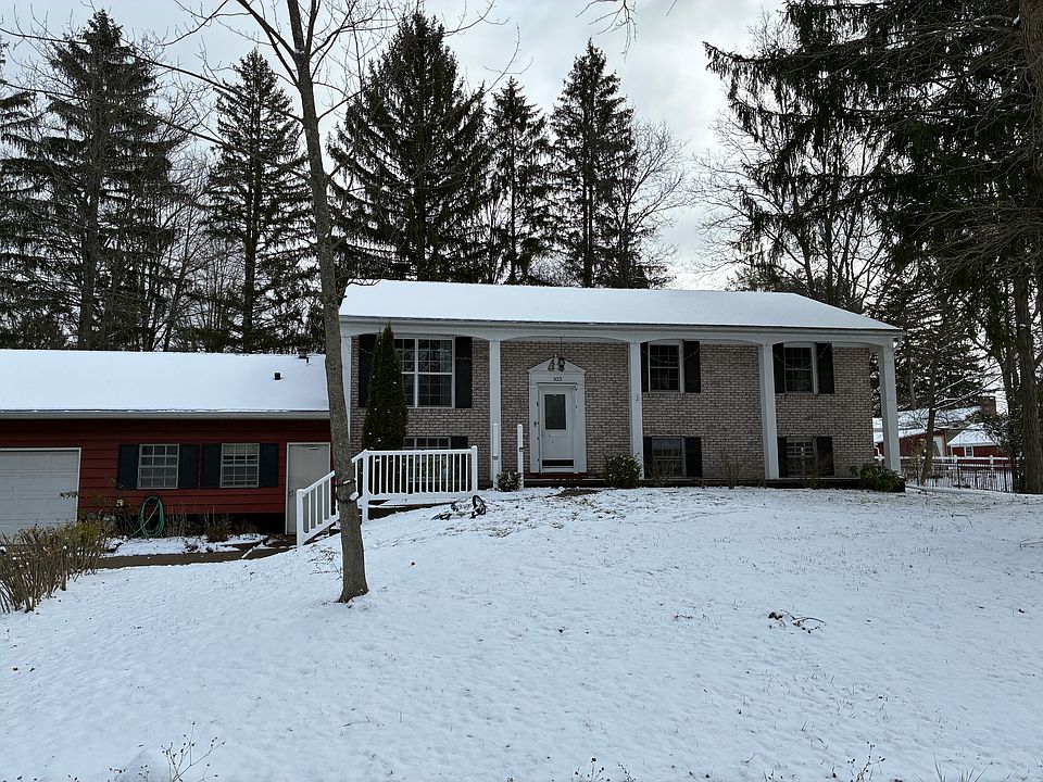 The beautiful house has two driveways, from Salem Drive and Birchwood Drive.