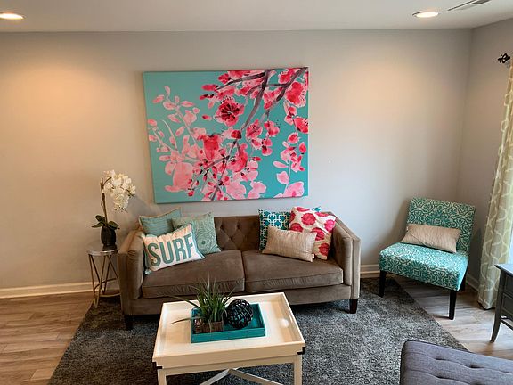 Living Room: Large windows, East facing. Lots of natural sunlight. Canned lights on dimmers, Luxury vinyl flooring.