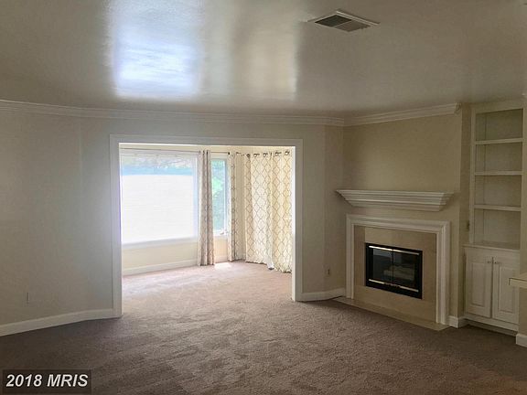 Living Room w/gas fireplace & bookcase