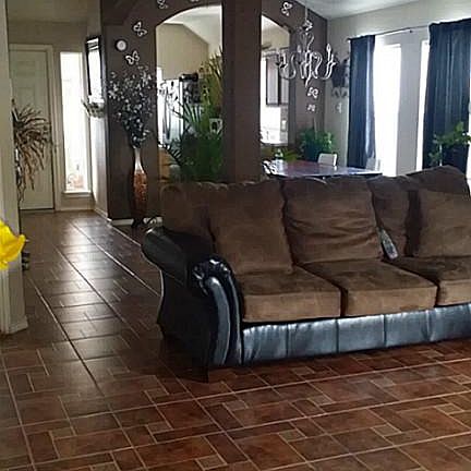 VIEW OF DEN TOWARDS THE DINING ROOM AND KITCHEN