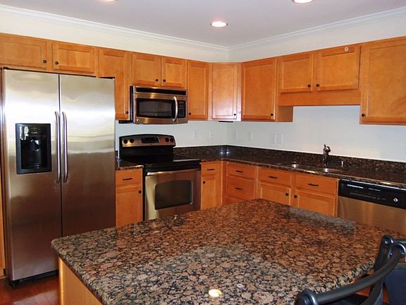 Granite work island with room for bar stools