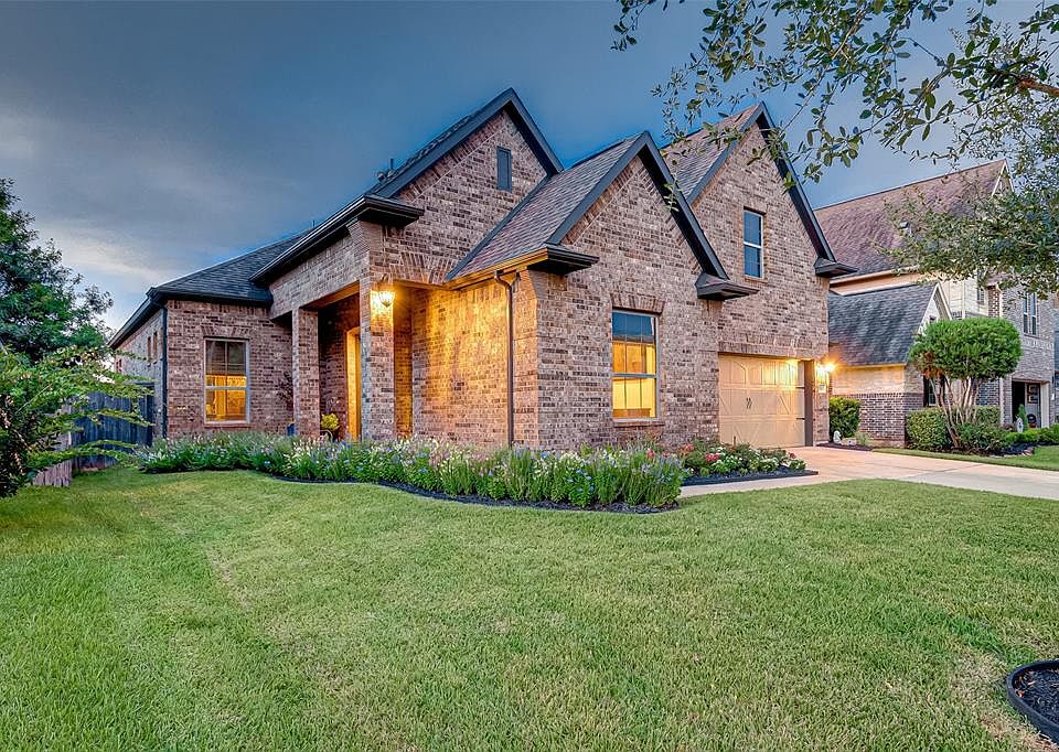Stunning dusk photo taken of this beautiful 2-story M/I home featuring the highly desirable "Sophia" floor plan.