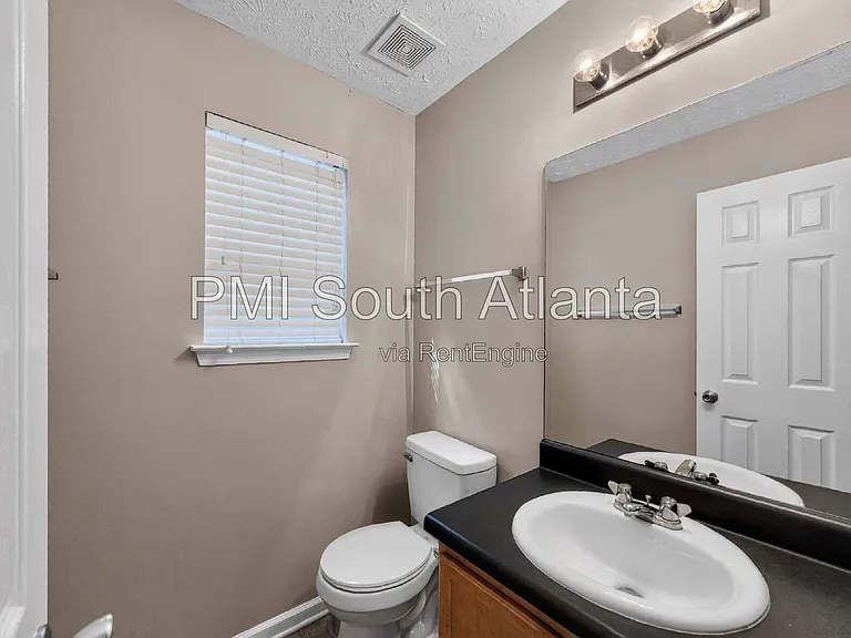 5722 Shoals Place Trl — Photo 15