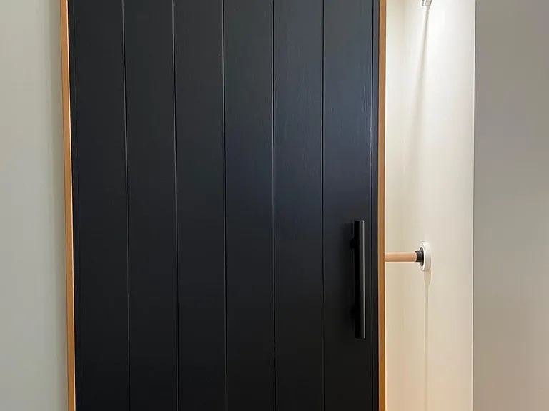 Downstairs bedroom/office closet. Fits a queen bed easily.