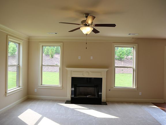 Family room overlooks private backyard