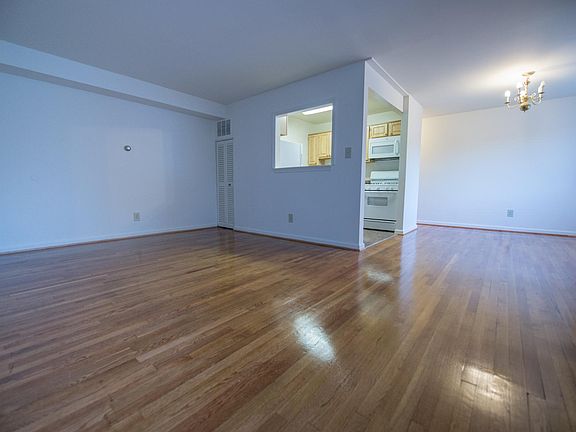 Entry view of living room, dining room, and kitchen