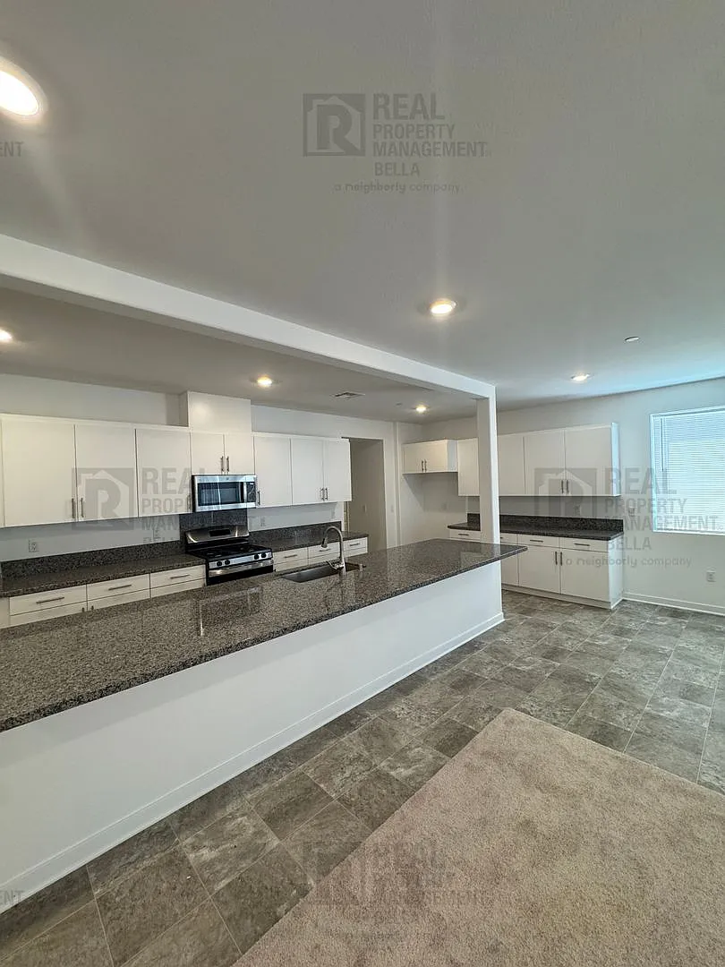 Spacious 5-Bedroom Home with Huge Loft & 3-Car Garage! — Photo 4