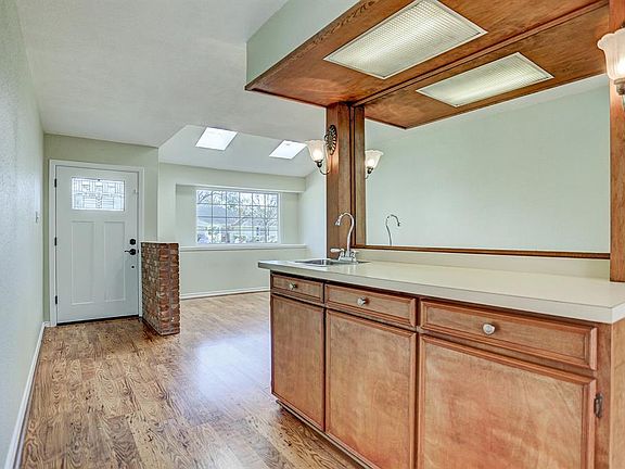 Front Door with lead glass, Dining Room, and Wet Bar