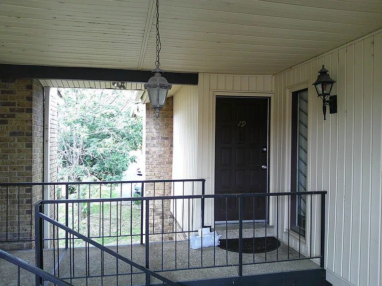 Second floor residence with no owner on top. End unit.