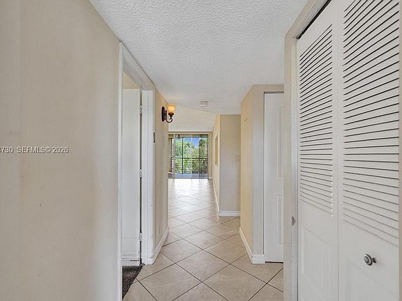 5th image of 9520 Seagrape Dr APT 306