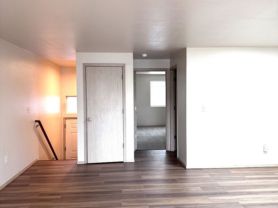 Living room, front entry stair, coat closet, entry into master bedroom and bathroom