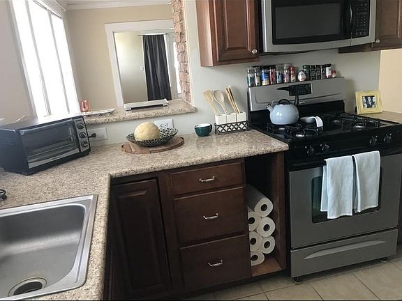 Updated kitchen with stainless steel appliances