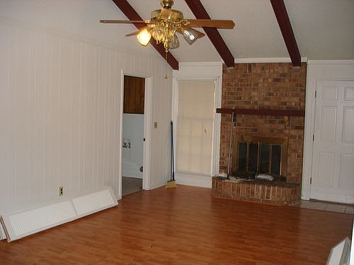 Cathedral ceiling living room with fireplace
