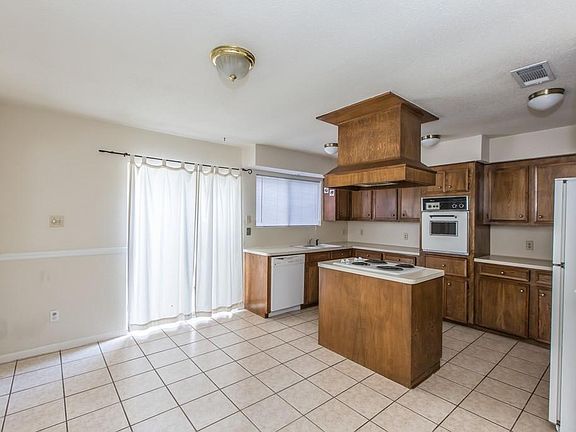 View of Kitchen leading to the backyard