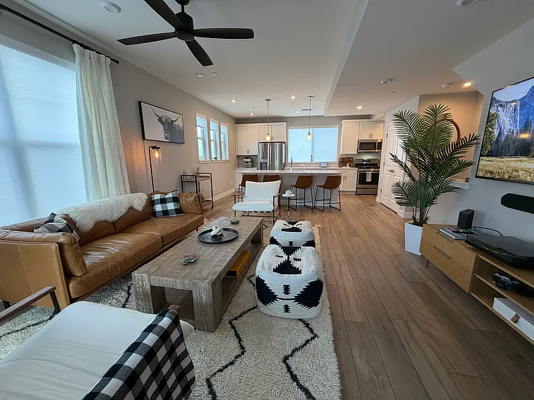 Living room opens to kitchen