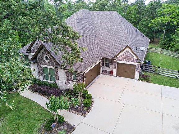 Amazing property with a three car garage and a fully fenced extra side yard.