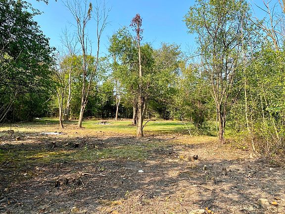 Wooded Lot entering off 130th place. Very secluded yet neighbors all around. Unincorporated area Coo