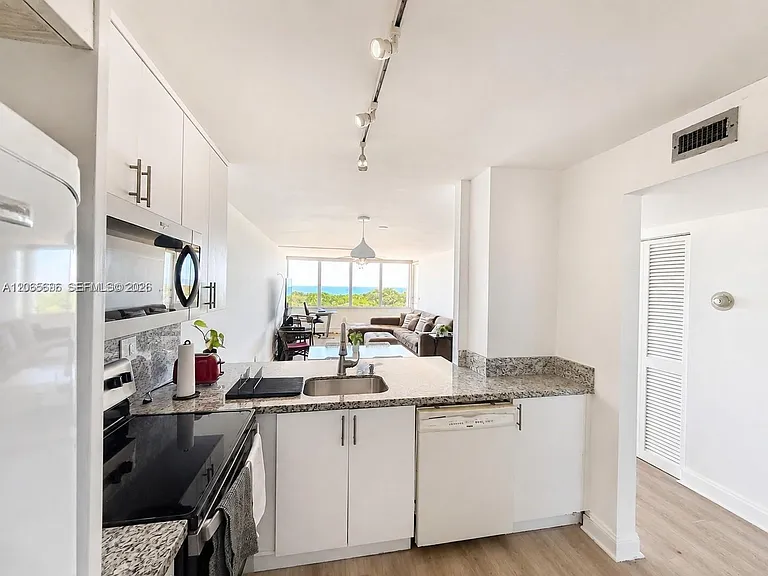 8233 Harding Ave #703 — Photo 3