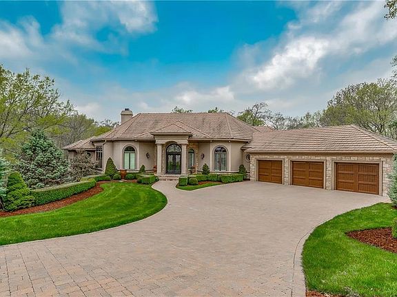 Completely Renovated Reverse 1.5 Story on 2.1 Wooded Acres