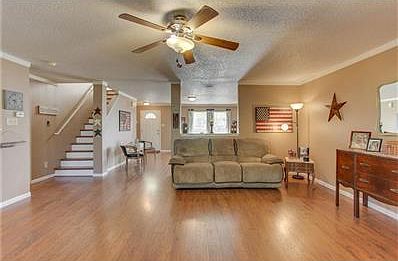 Great floor plan with modified wall divider for open concept living. Stairs have hardwood treads
